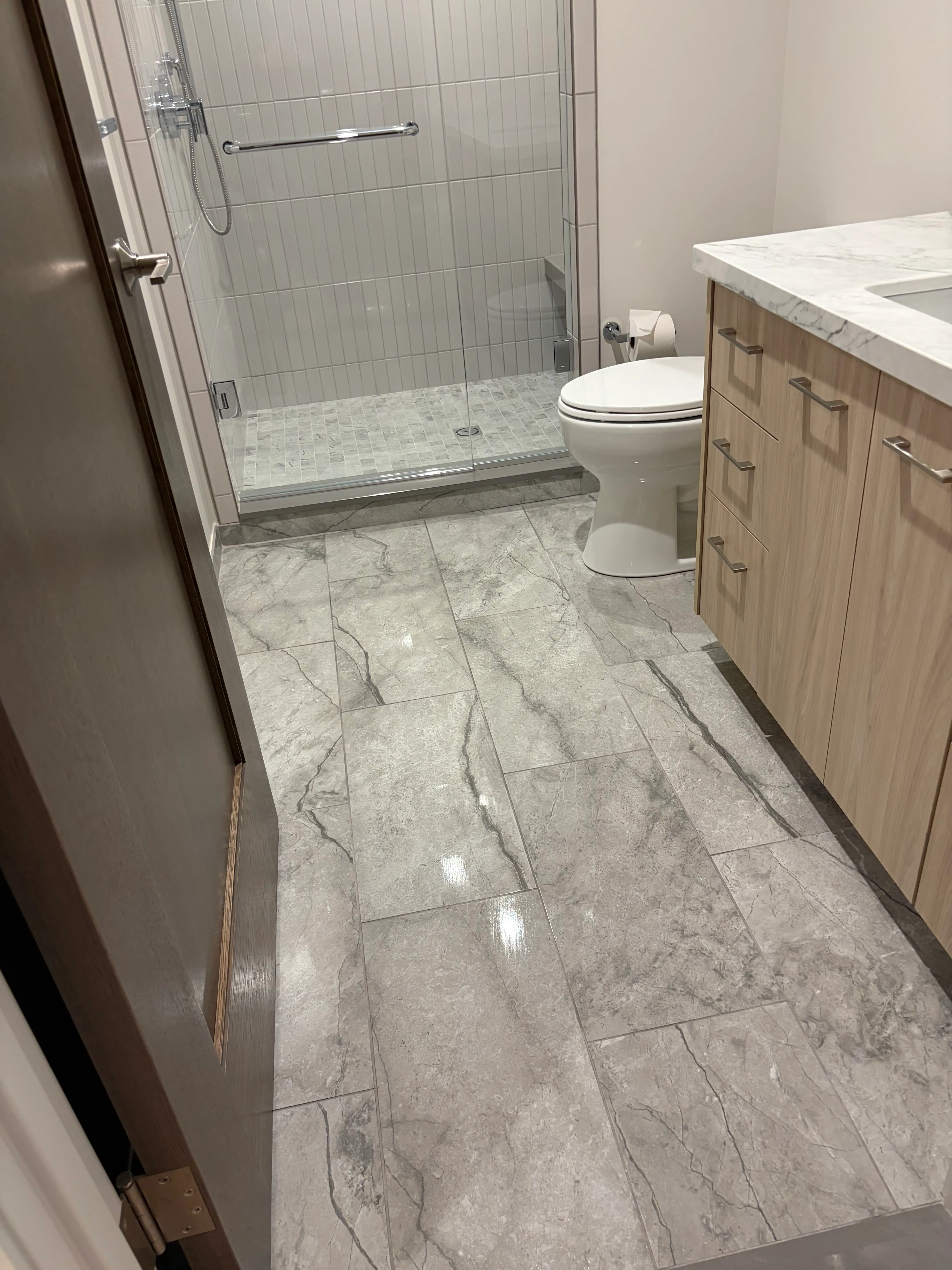 Cleaned bathroom floor at 370 Brown apartment in West Bloomfield, MI