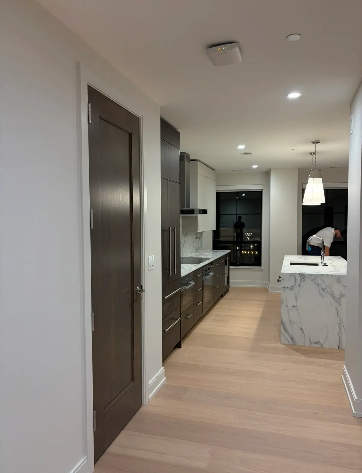 Cleaned kitchen and hallway at 370 Brown apartment in West Bloomfield, MI